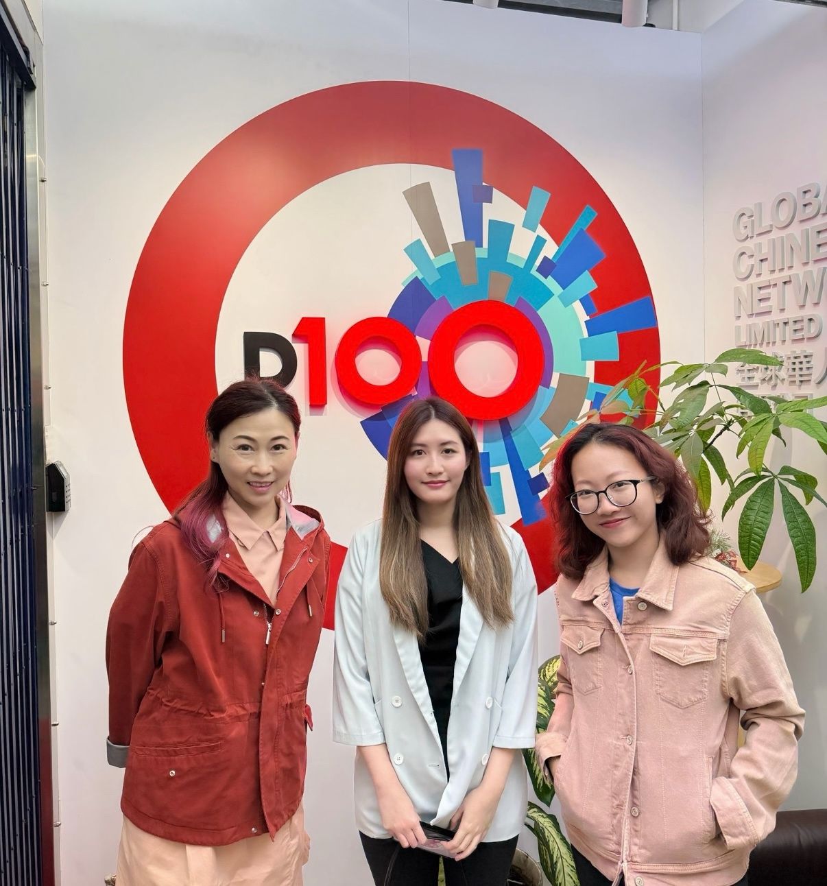 Dr Jasmine with the D100 programme hosts in the studio lobby